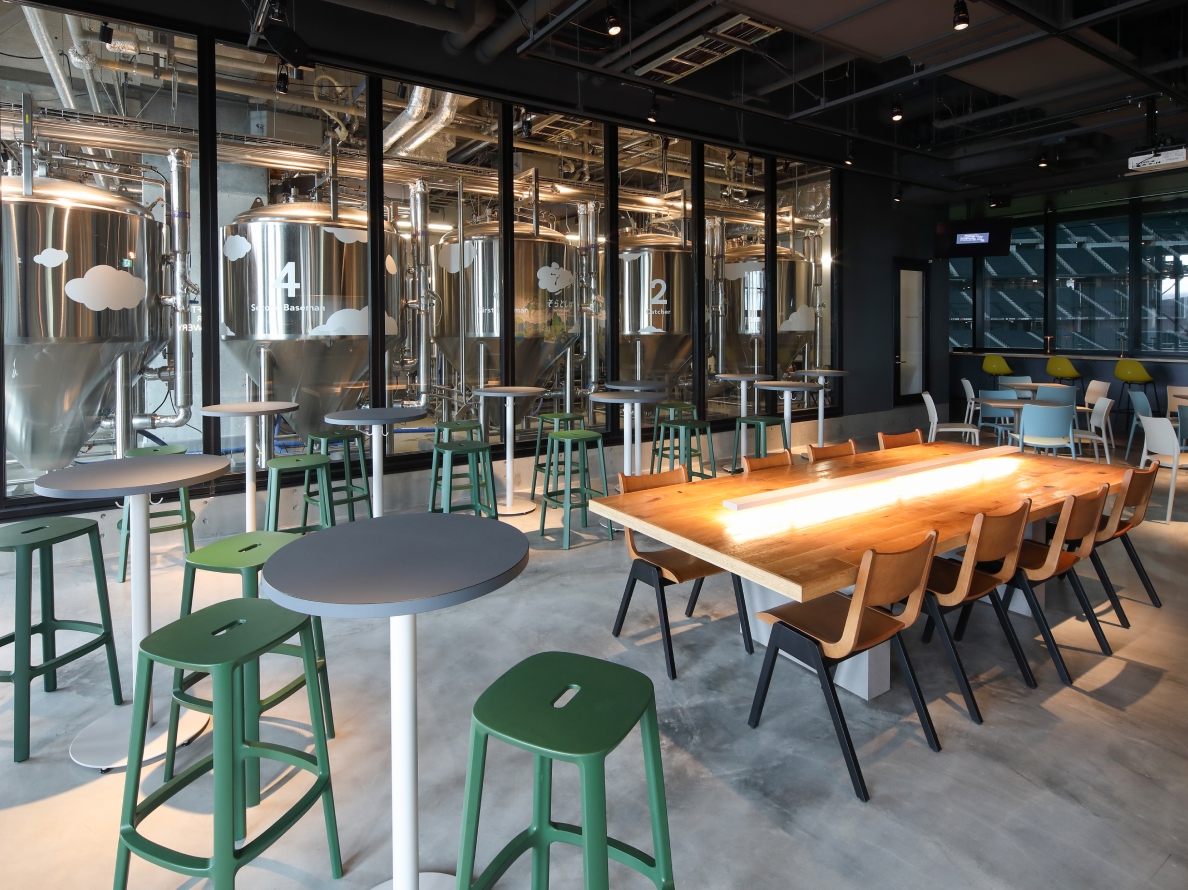 Interior of SORA TO SHIBA where brewing facilities are visible through large glass windows