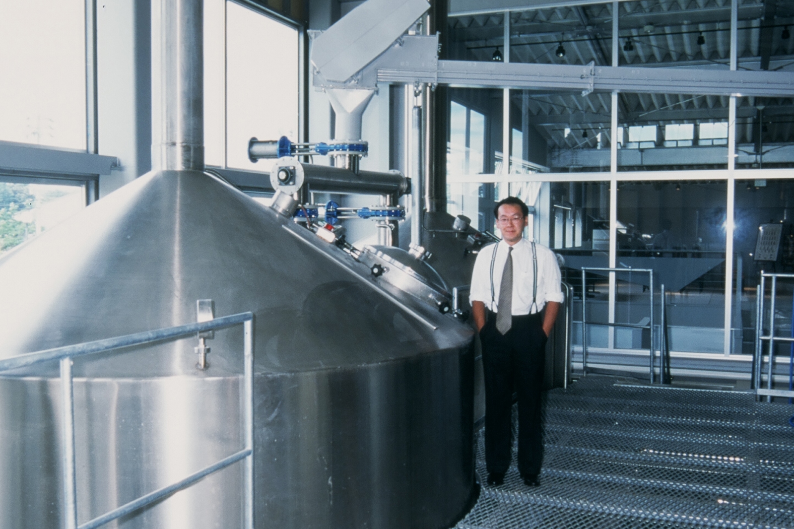 Large brewing tanks and the founder