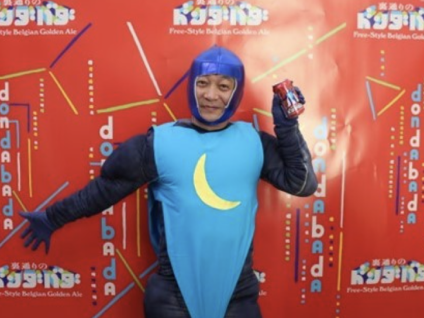"Tencho" dressing up in a costume inspired by Dondabada